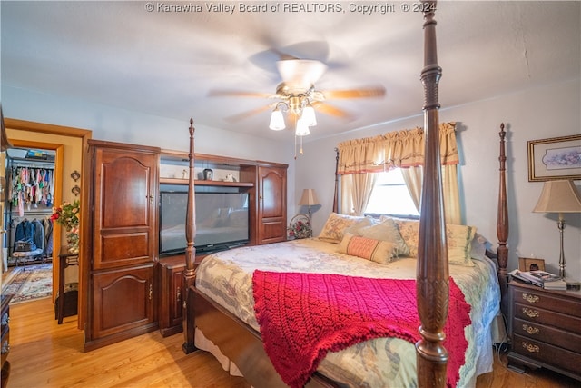 bedroom featuring light hardwood / wood-style flooring and ceiling fan