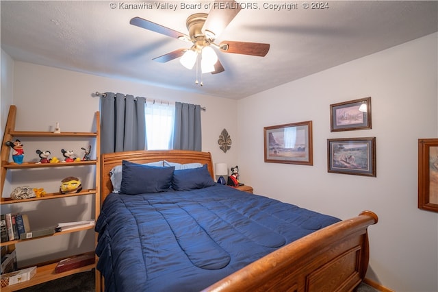 bedroom featuring ceiling fan