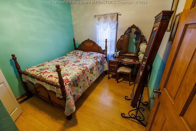 bedroom featuring light hardwood / wood-style flooring