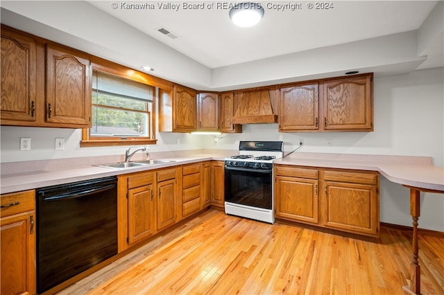 kitchen featuring premium range hood, sink, dishwasher, white range with gas stovetop, and light wood-type flooring