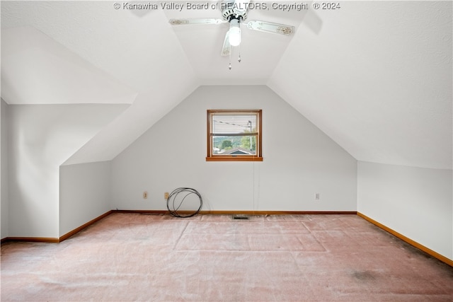 bonus room with vaulted ceiling, ceiling fan, and carpet floors