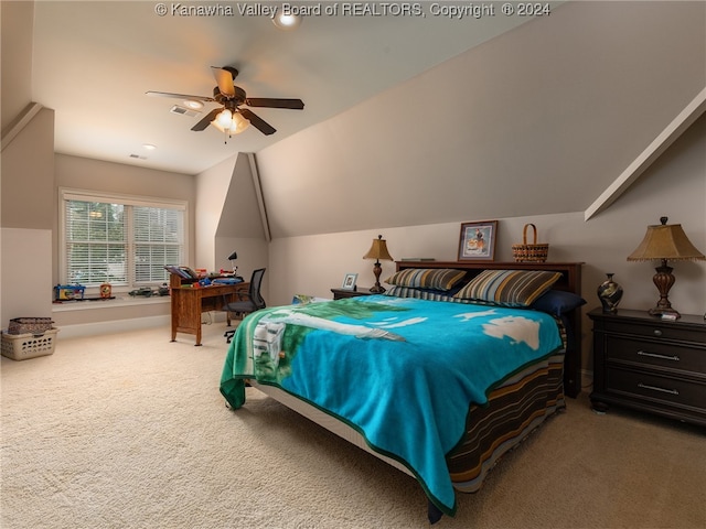 bedroom featuring lofted ceiling, carpet flooring, and ceiling fan