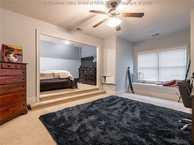 carpeted bedroom with ceiling fan