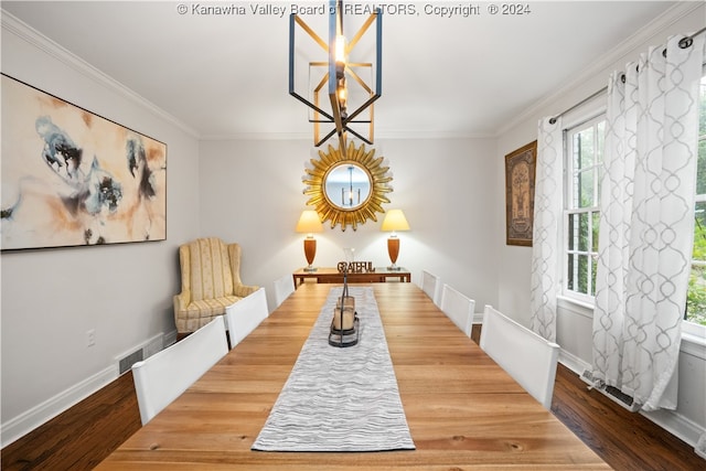 dining area with an inviting chandelier, wood-type flooring, and ornamental molding