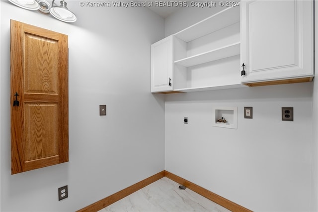 laundry room featuring hookup for a washing machine, cabinets, and hookup for an electric dryer