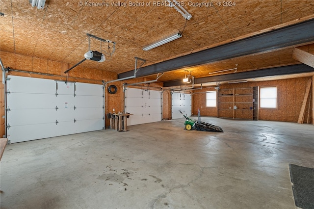 garage featuring a garage door opener