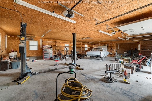 garage featuring a garage door opener