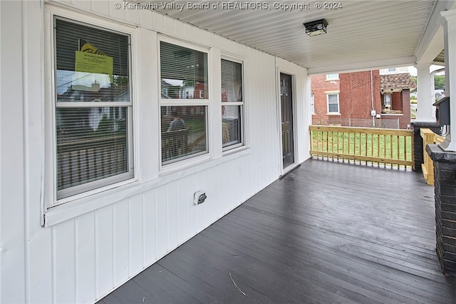 deck with covered porch