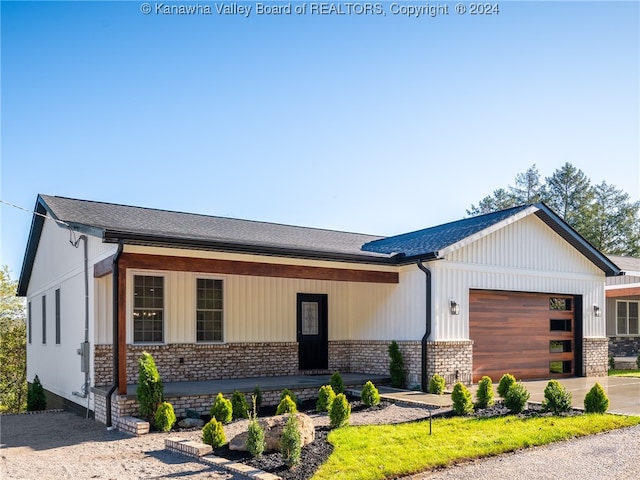 view of front of home with a garage