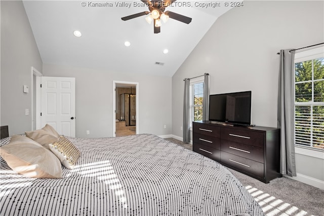 carpeted bedroom featuring high vaulted ceiling and ceiling fan