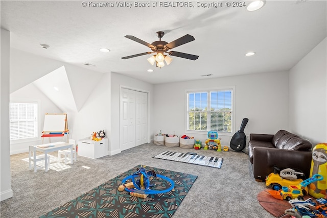 rec room featuring ceiling fan and carpet floors