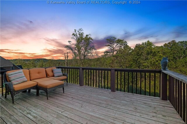 wooden deck featuring an outdoor hangout area