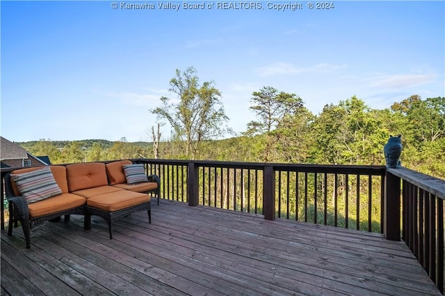 deck with an outdoor hangout area