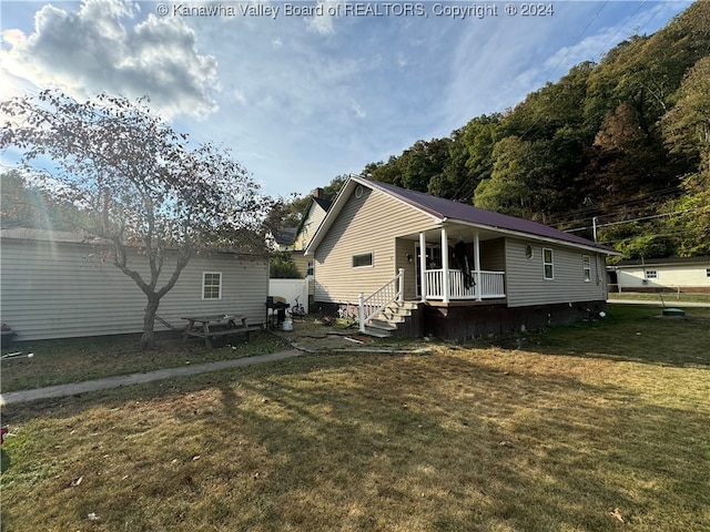 exterior space with a front lawn