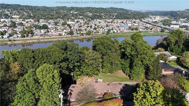 drone / aerial view with a water view