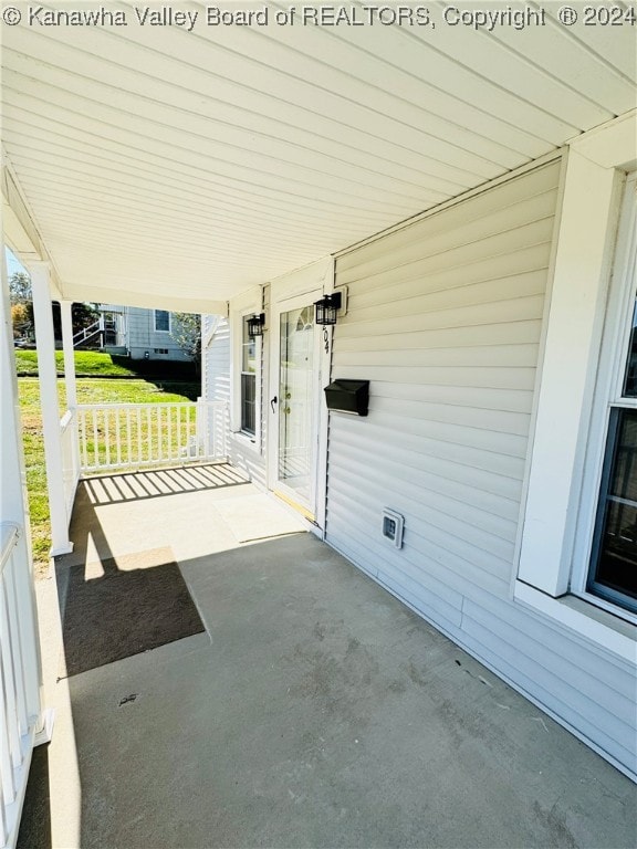 view of patio featuring a porch