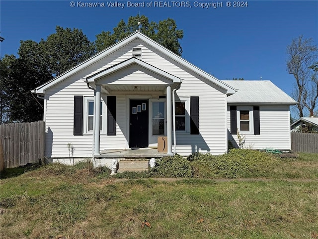 view of front of home with a front yard