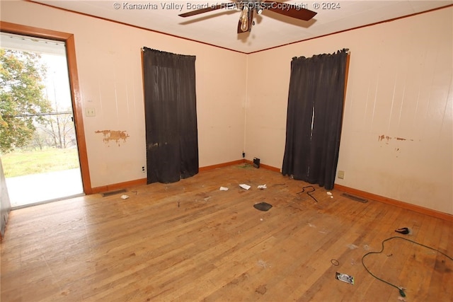 unfurnished room with ceiling fan and light hardwood / wood-style flooring