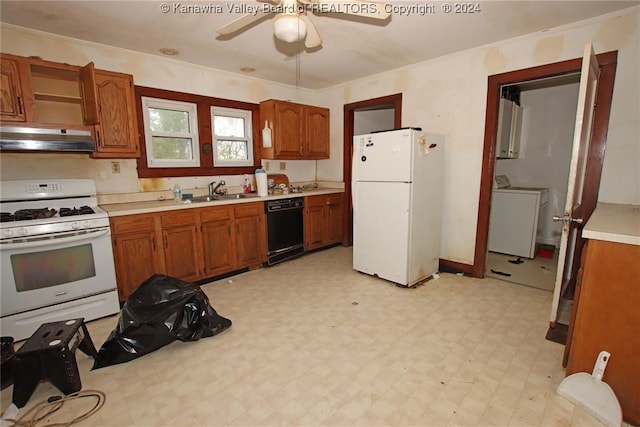 kitchen with ceiling fan, ornamental molding, sink, white appliances, and washer and clothes dryer