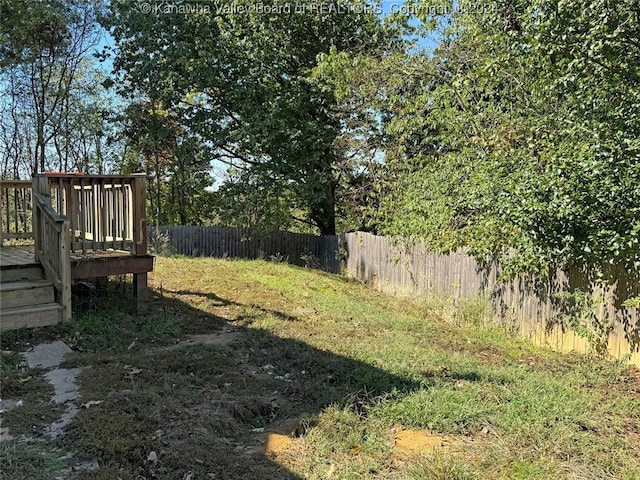 view of yard with a deck