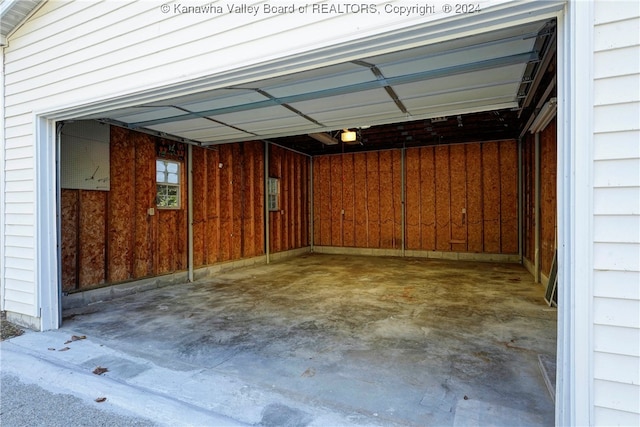 garage with wood walls