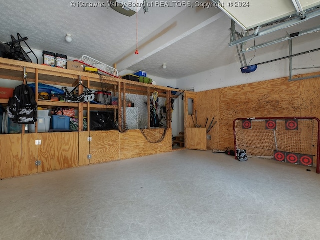 garage featuring a garage door opener