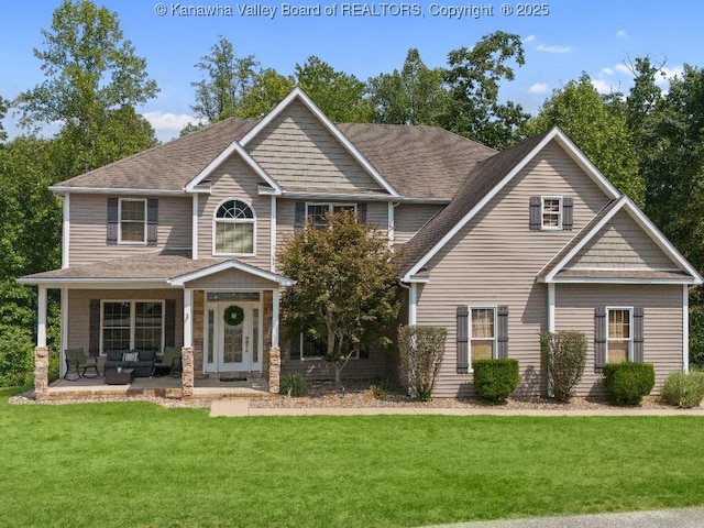 view of front facade featuring a front lawn and a porch