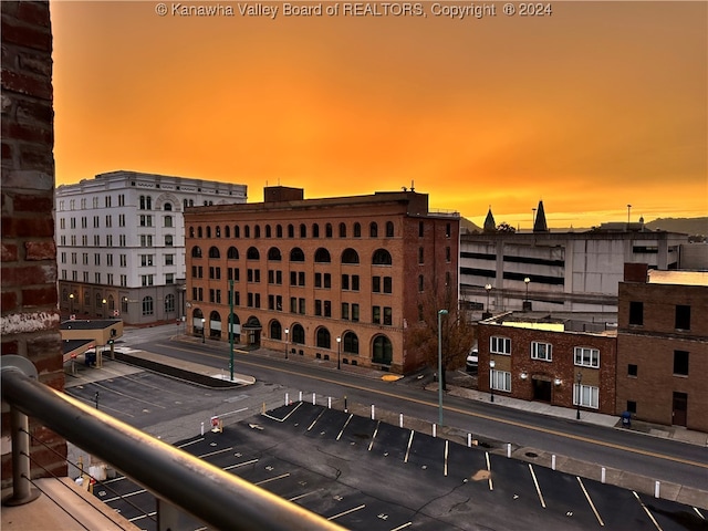 view of outdoor building at dusk