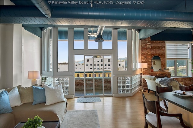 interior space featuring hardwood / wood-style flooring and a healthy amount of sunlight