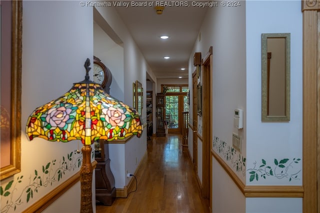 hallway featuring wood-type flooring