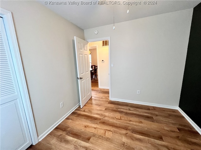 unfurnished bedroom featuring light hardwood / wood-style floors