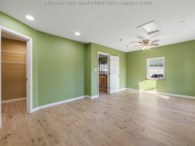 unfurnished room featuring light wood-type flooring