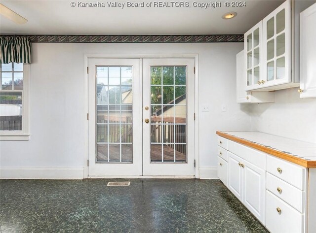 doorway to outside with french doors, baseboards, and recessed lighting