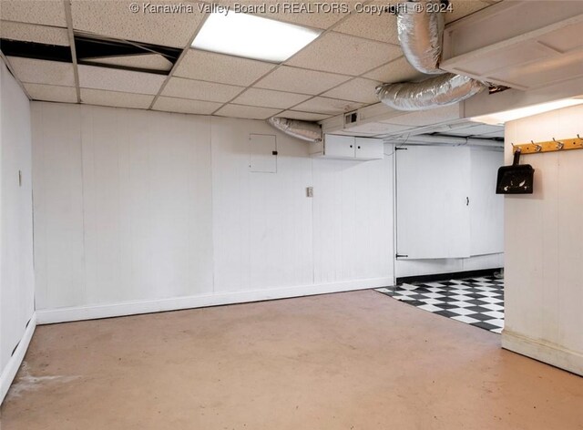 below grade area featuring baseboards