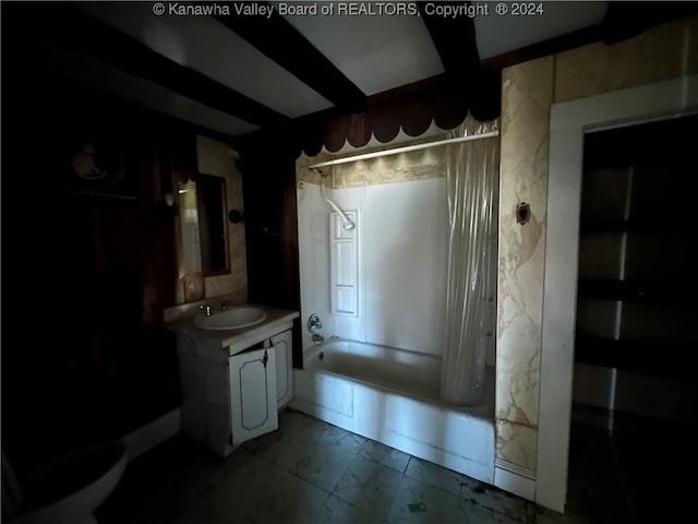 bathroom featuring vanity and shower / tub combo