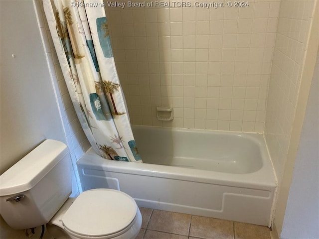 bathroom featuring shower / bath combo, toilet, and tile patterned flooring