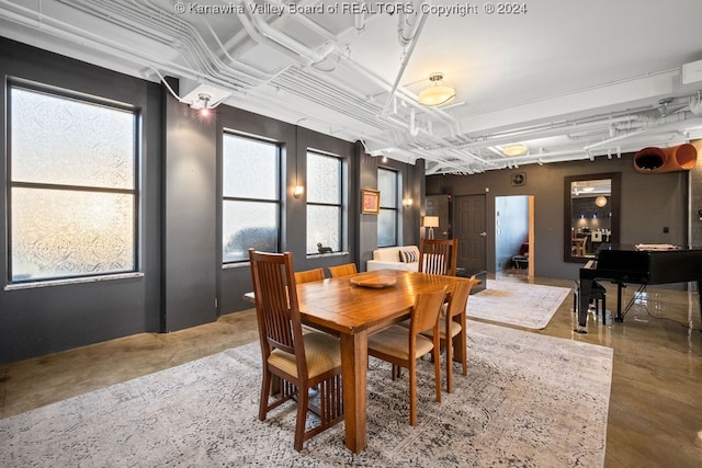 dining room with concrete floors