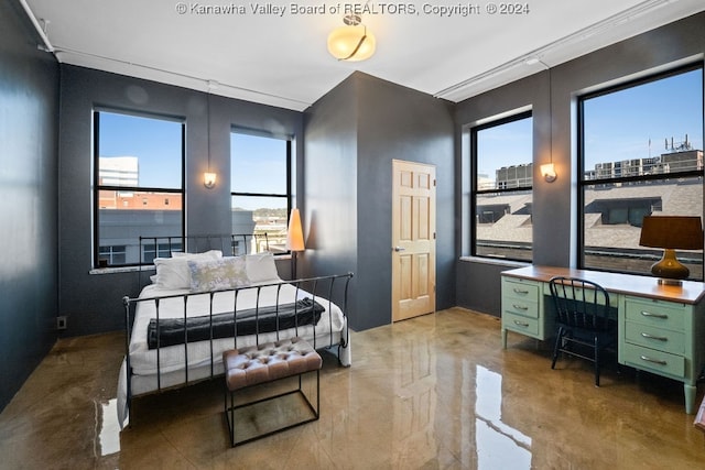 bedroom with concrete floors