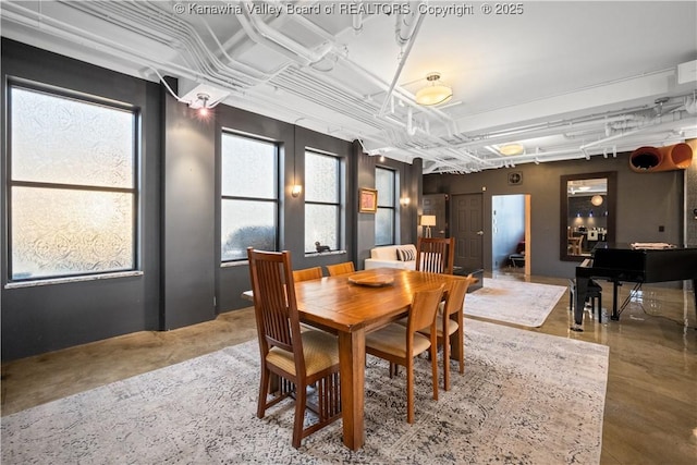 109 Capitol St Unit 400, Charleston, WV 25301 - dining area featuring concrete floors