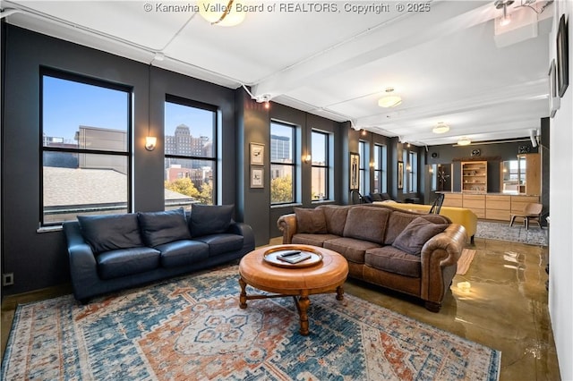 109 Capitol St Unit 400, Charleston, WV 25301 - living room with finished concrete floors