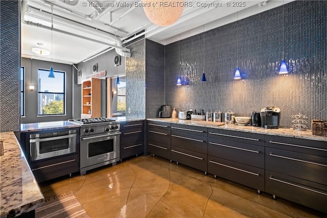 109 Capitol St Unit 400, Charleston, WV 25301 - kitchen with appliances with stainless steel finishes, light stone counters, concrete floors, decorative light fixtures, and decorative backsplash