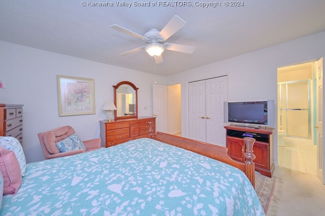 bedroom featuring a closet, ceiling fan, and light carpet