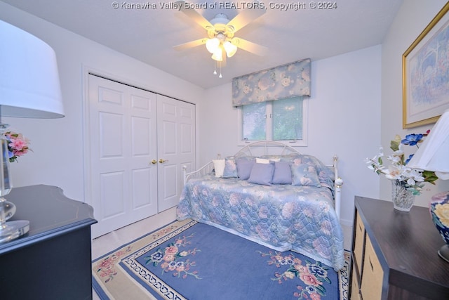 bedroom featuring a closet and ceiling fan