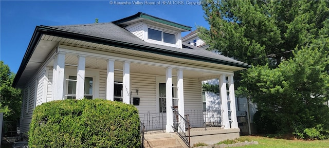 view of front of home featuring covered porch