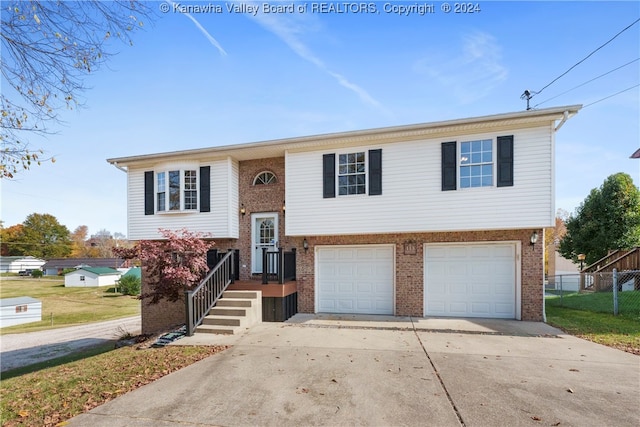 bi-level home featuring a garage