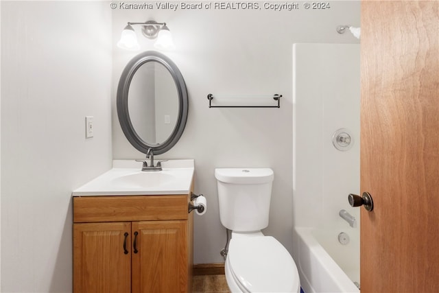 full bathroom featuring vanity, toilet, and  shower combination