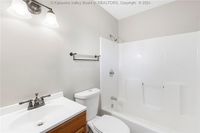 full bathroom with vanity, shower / bathing tub combination, and toilet