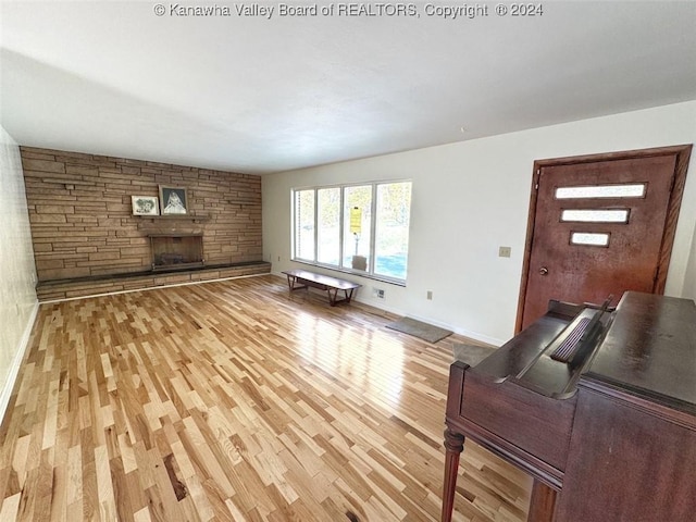 1526 Trace Fork Rd, South Charleston, WV 25309 - living room with light wood-style flooring and a fireplace