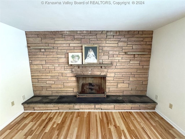 1526 Trace Fork Rd, South Charleston, WV 25309 - detailed view of wood finished floors and a fireplace
