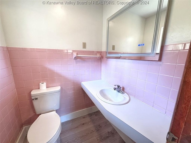 1526 Trace Fork Rd, South Charleston, WV 25309 - bathroom with wood finished floors, tile walls, wainscoting, and vanity